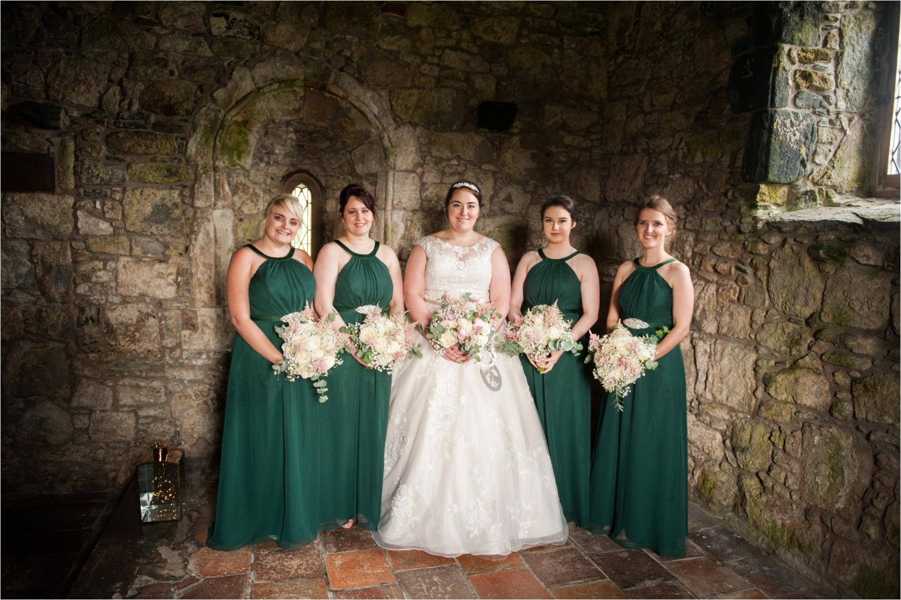 bride and bridesmaids at st clements church wedding photograph