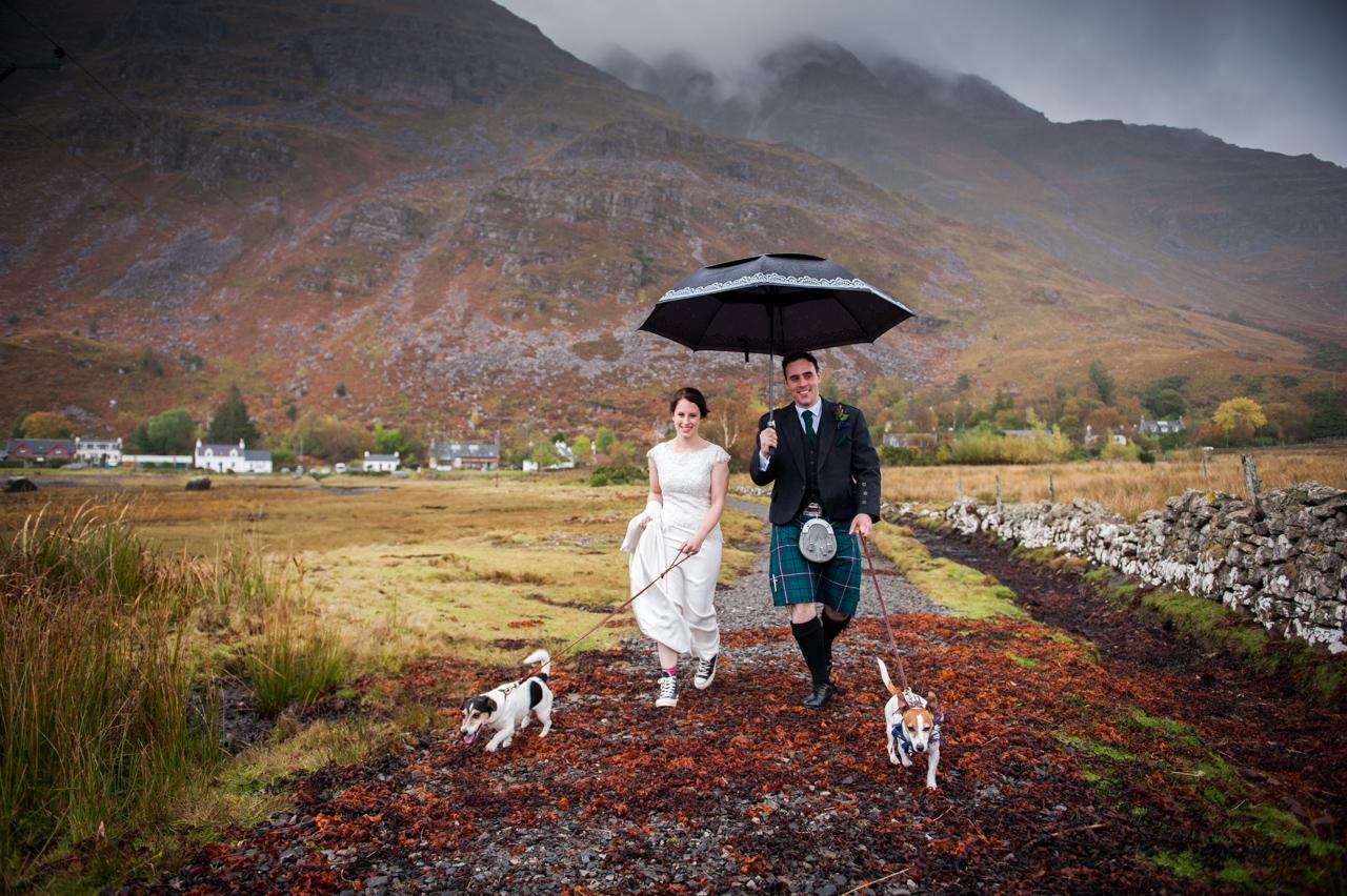 bride and groom with jack Russells at Torridon