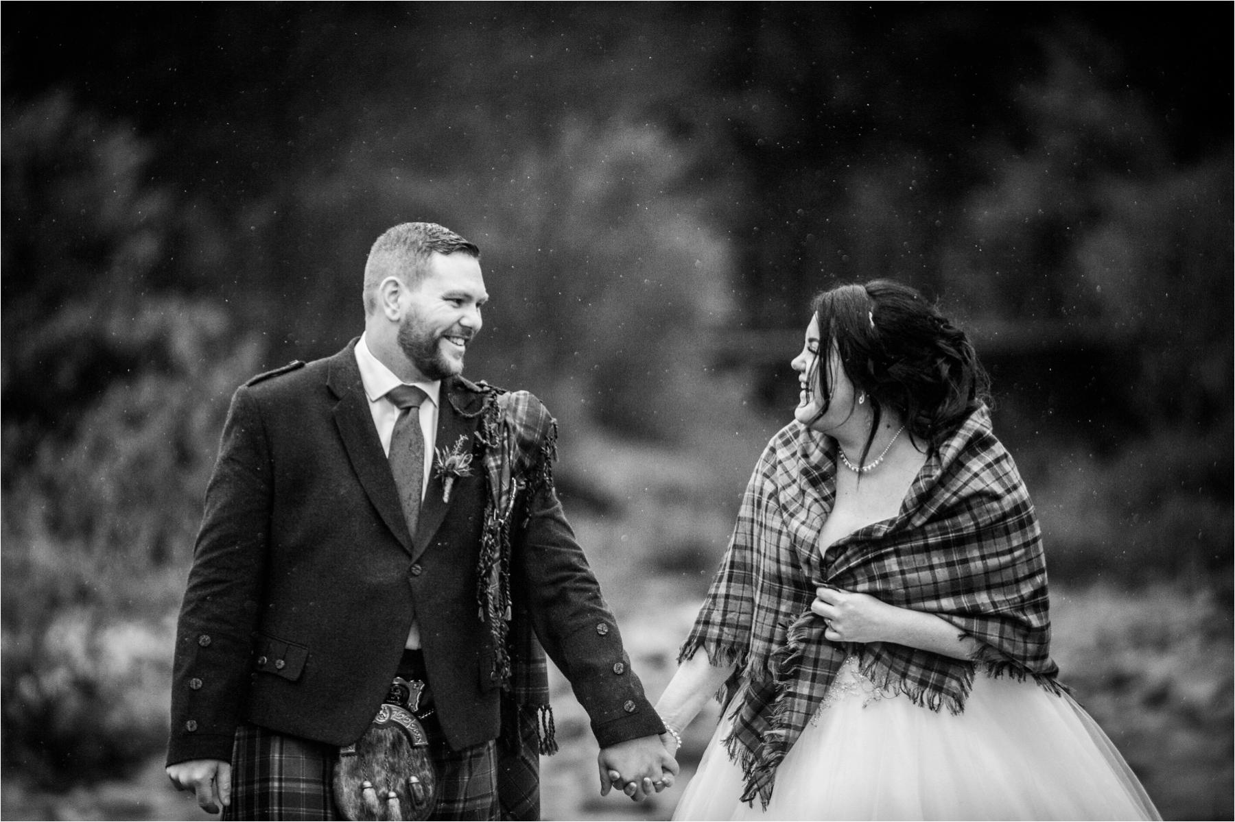 wedding portrait shot at scottish highland ceremony in the rain 