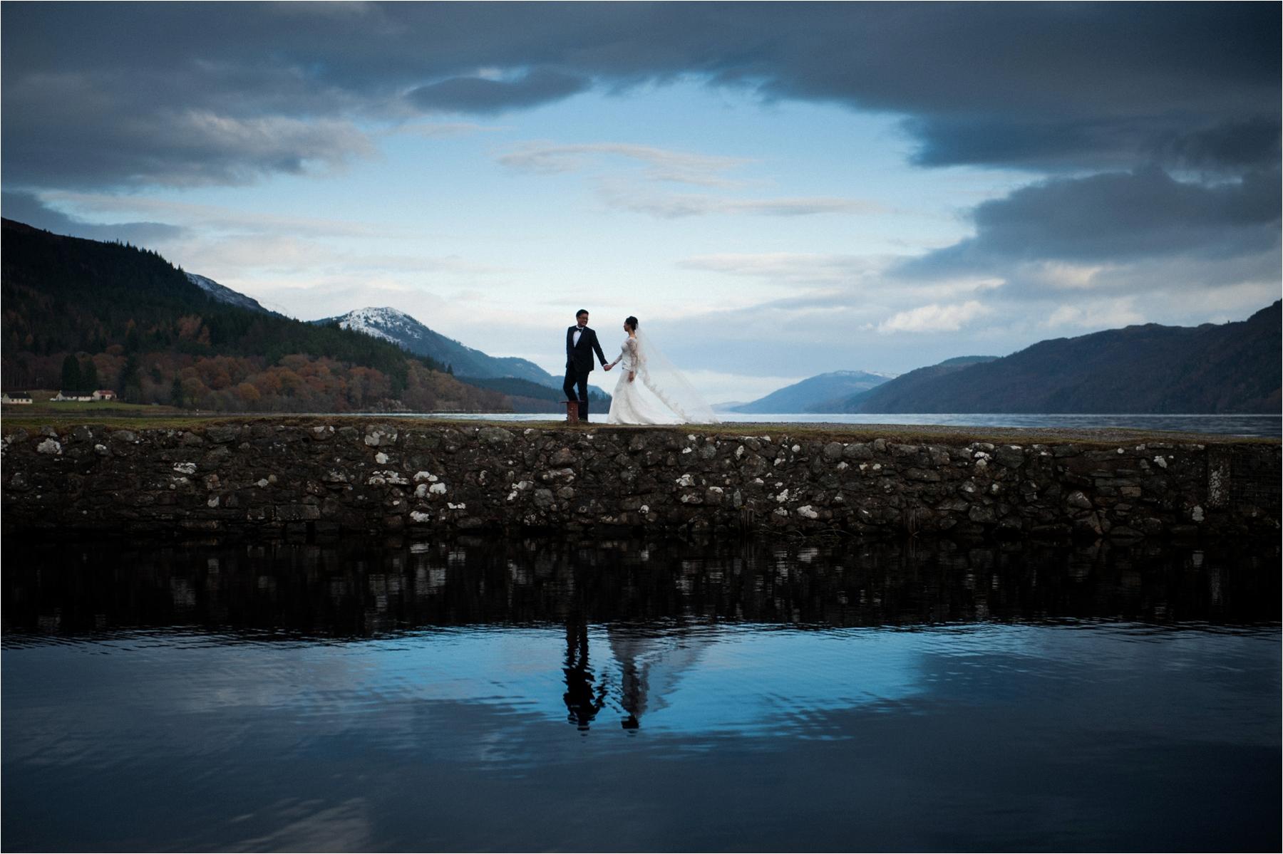 Couple shot on banks of Loch Ness margaret Soraya photography