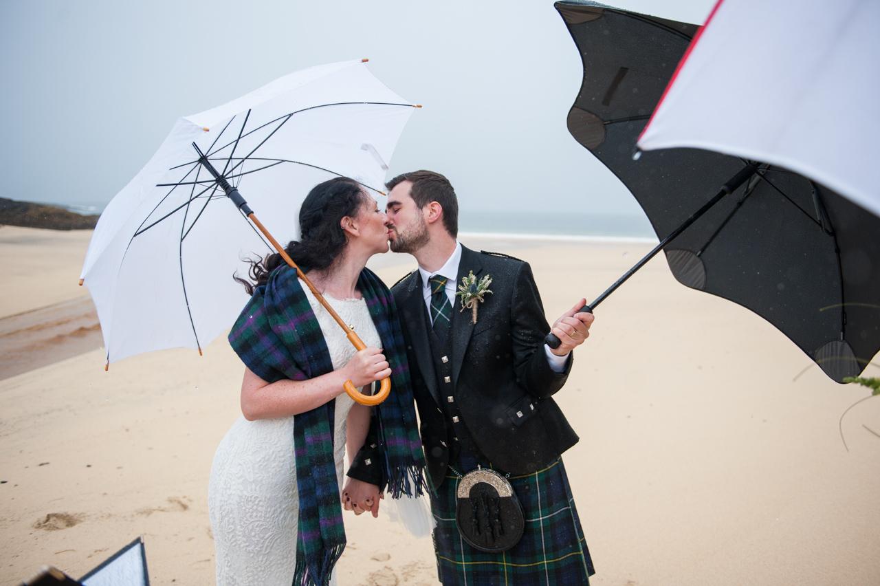 bride and groom during borve beach wedding ceremony photograph