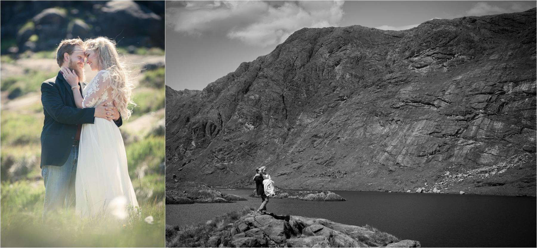 A man and a woman stand together during their portrait shoot on Loch Coruisk on the Isle of Skye. 