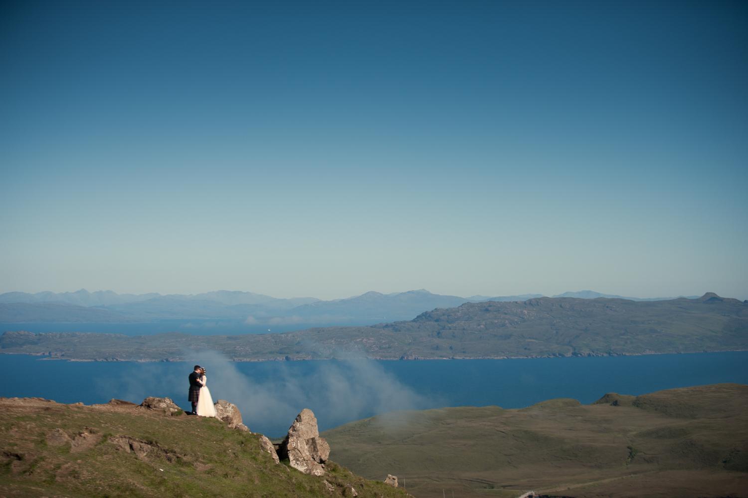 wedding photographs taken on the old man of storr looking over the isle of skye 