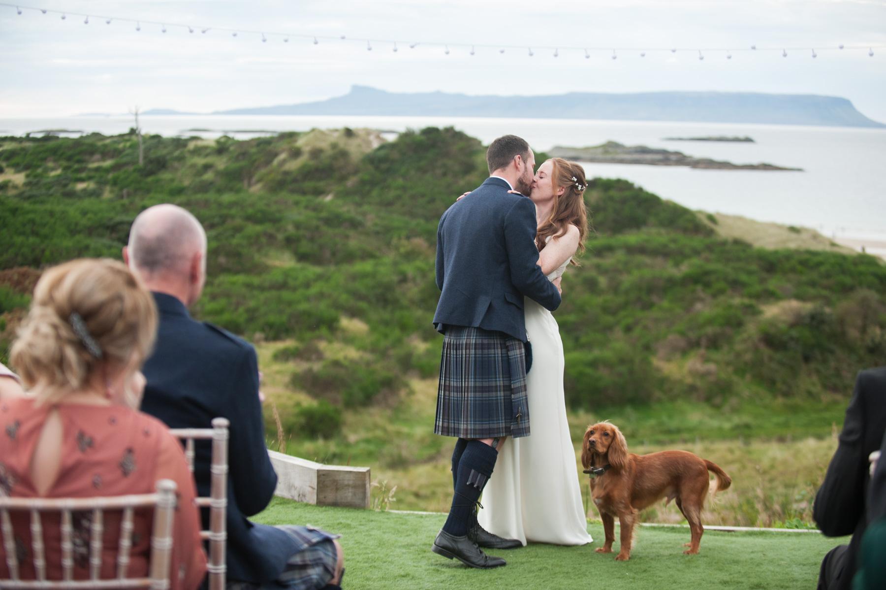 wedding ceremony watched by dog at Morar scottish highlands