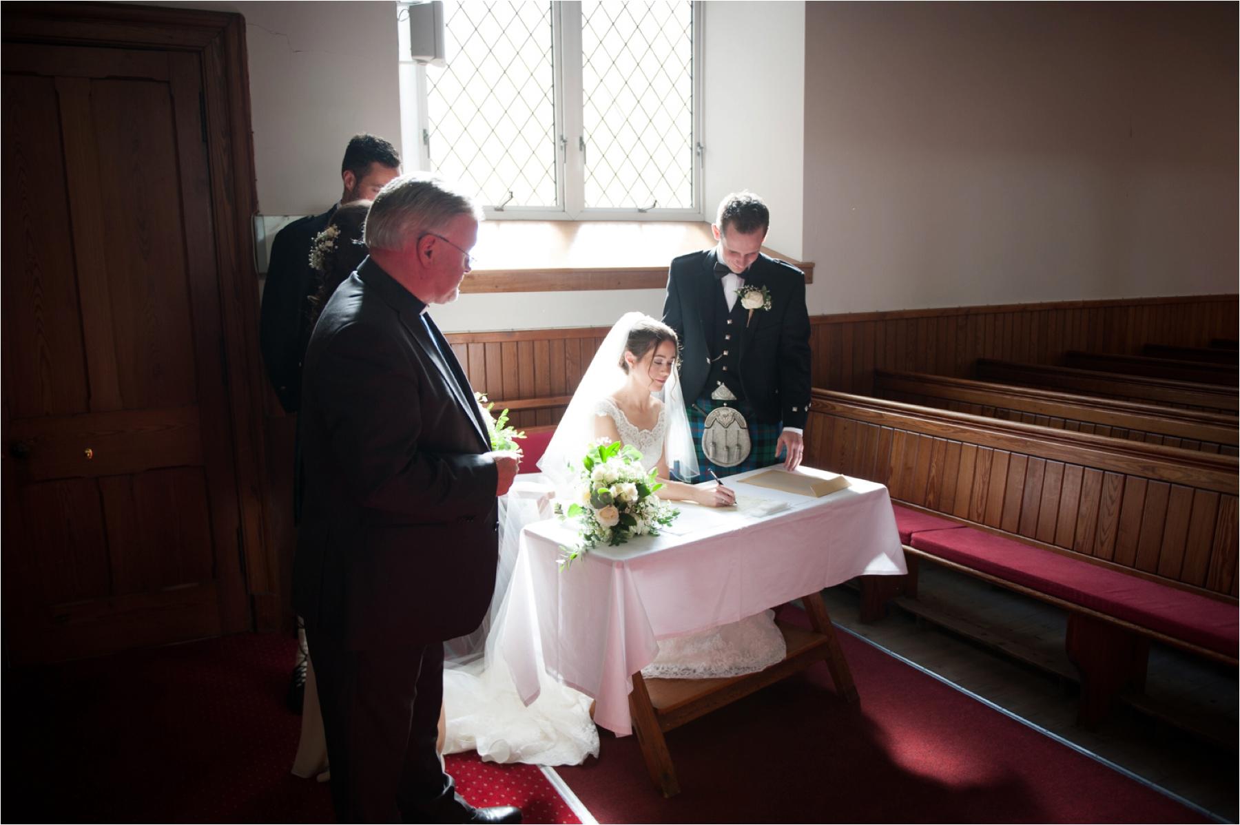 signing the register photograph at stornoway wedding