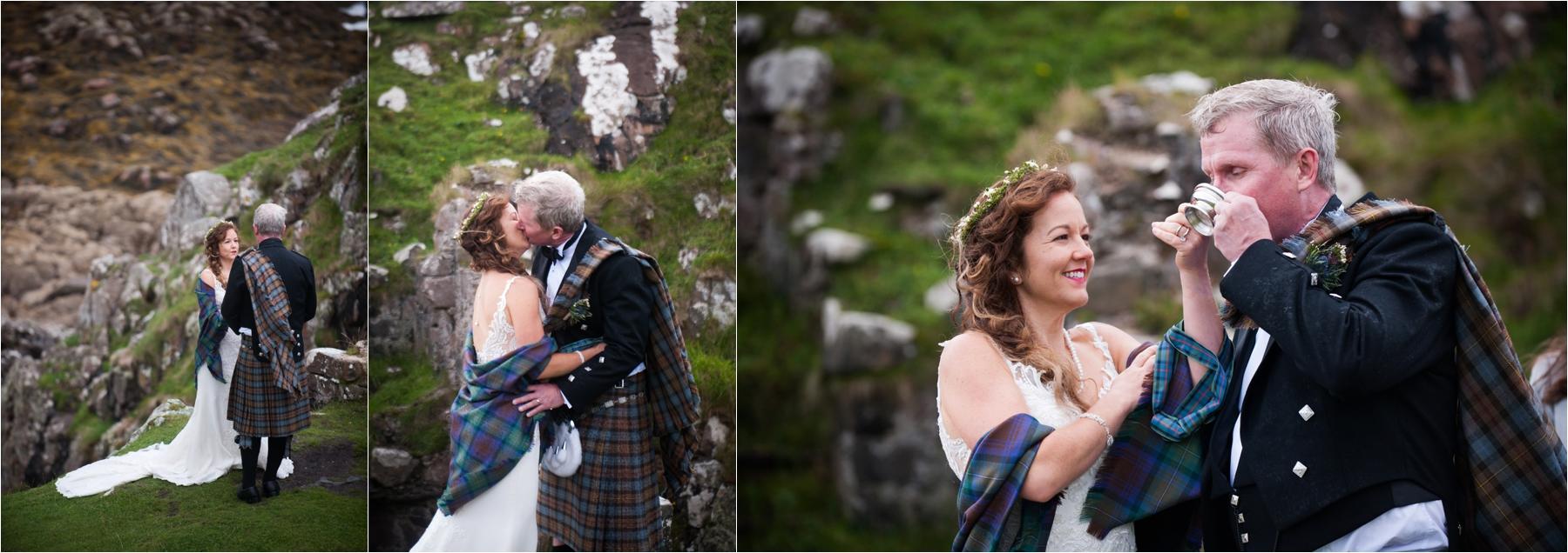 A bride and groom kiss after their humanist marriage ceremony in the ruined Dunscaith Castle. 